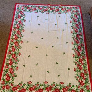51" x 68" oblong fabric tablecloth with small poinsettia print